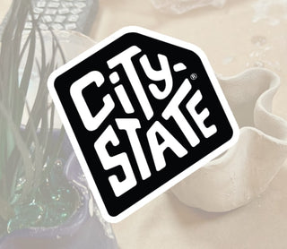 Black 'City-State' logo on a textured beige background