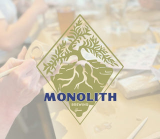 Monolith Brewing logo with a blurred background of people sculpting clay with a tool.