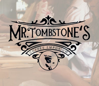 Logo of Mr. Tombstone's Coffee Emporium with a blurred background