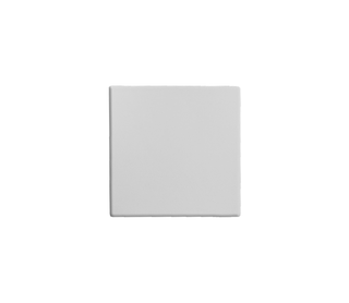 white rectangular object with textured surface on a white background