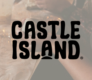Black Castle Island logo text centered over a softly blurred background showing a person holding a mug.