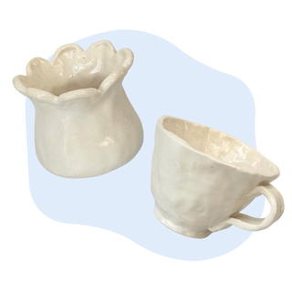 Two ceramic mugs on a white background