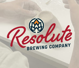 Resolute Brewing Company logo with a person holding a mug.