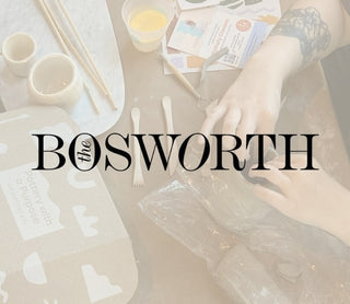 Table setting with pottery tools, featuring 'the Bosworth' branding.